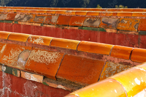 Details of ceramic tiles covering handrails of Putuo Zongcheng Buddhist temple in Chengde, China photo