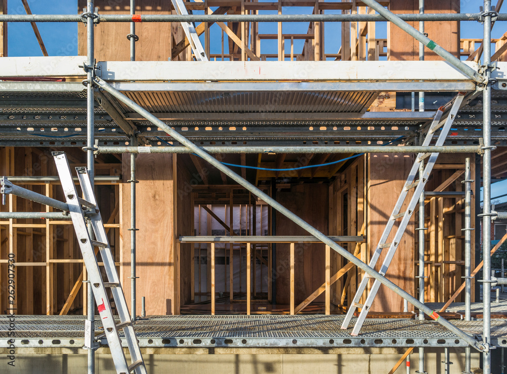 Scaffolding and ladders at a building site 