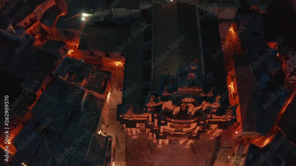 25P an aerial view of a cathedral flying backward and tilting up to reveal Ragusa Ibla 25P an aerial view of a cathedral flying backward and tilting up to reveal Ragusa Ibla