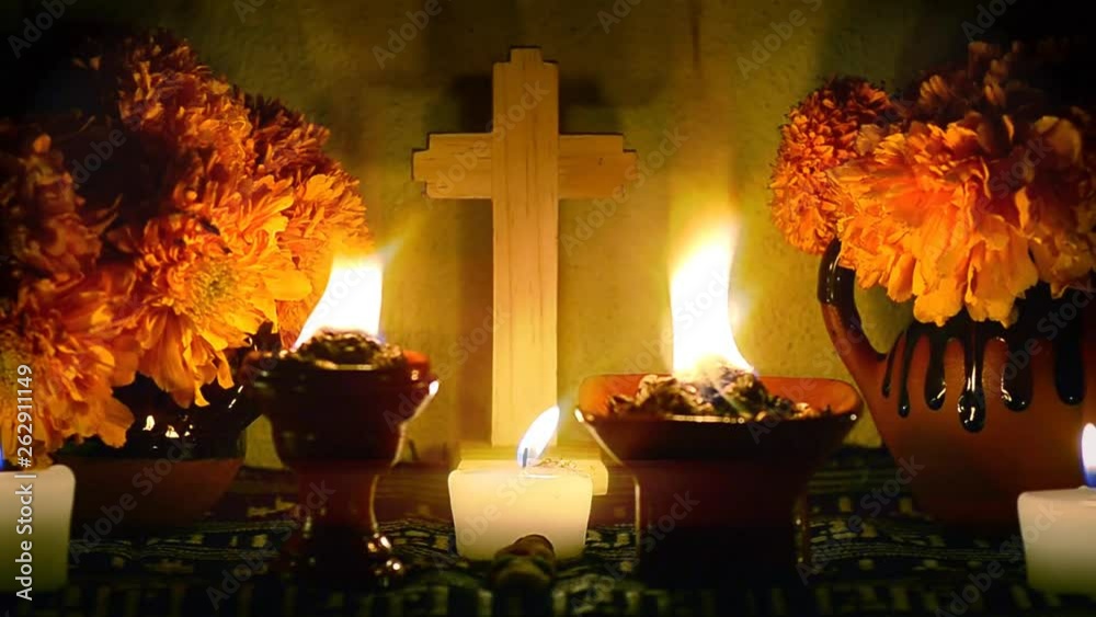 Slow zoom-out - Day of the dead offering altar with cempasuchil flowers, burning copal and candles. Essential part of Day of the Dead festivities in Mexico. 