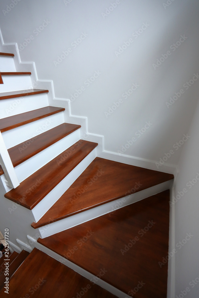 Obraz premium brown wooden hardwood stair in modern residential house