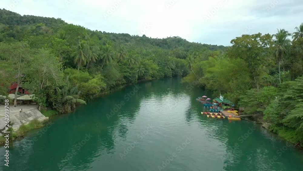 Drone crane shot over tropical river in Bohol island, Philippines. Drone crane shot over tropical river in Bohol island, Philippines.