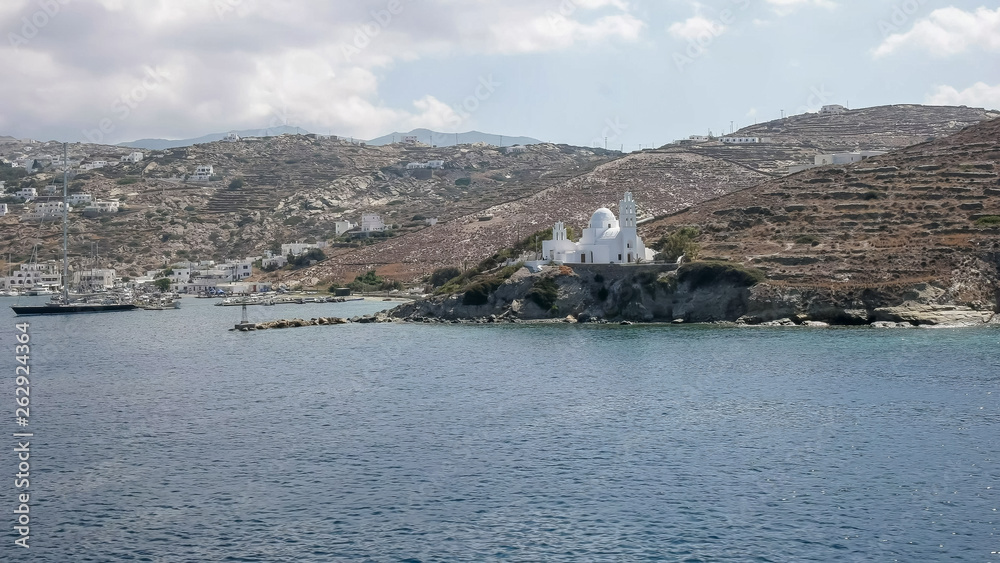 wide view agia irini church in ormos harboron the island of ios, greece