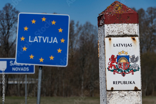 Ezere, Latvia The border sign between Latvia and Lithuania photo