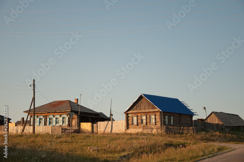 Siberian village. Houses on the hill.
