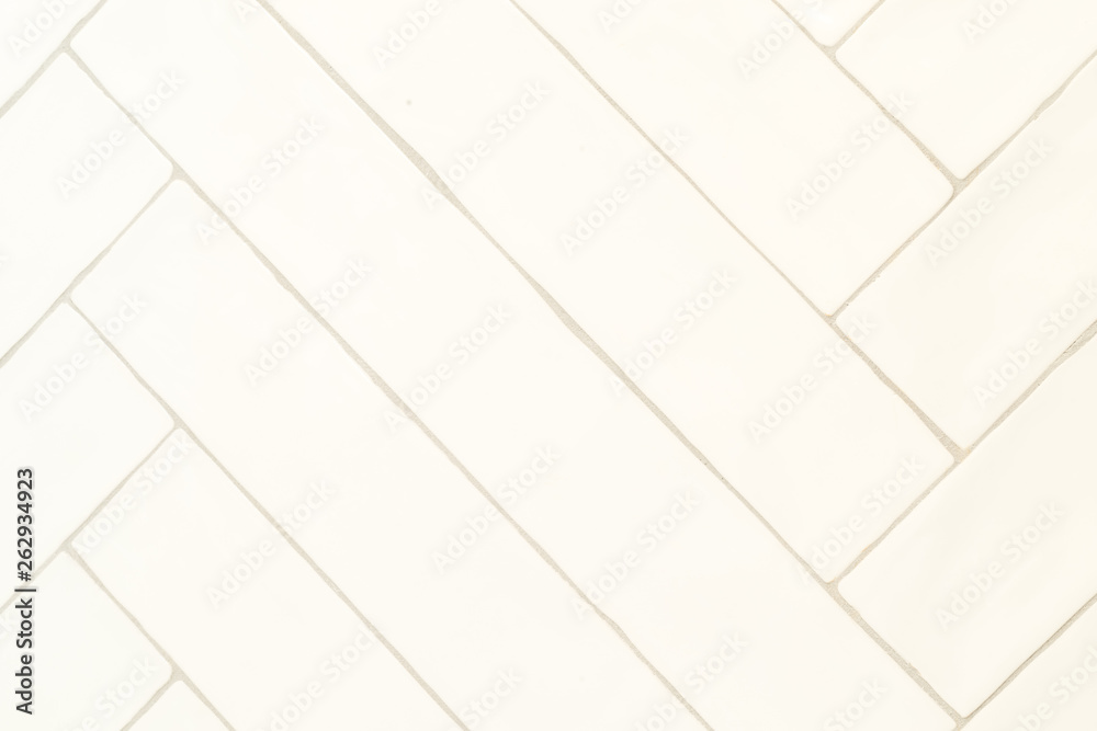 White tile herringbone pattern wall master bath with gray grout - obrazy, fototapety, plakaty 