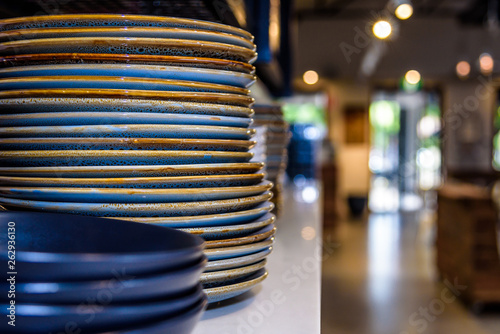 A stack of dinner plates ready for restaurant service