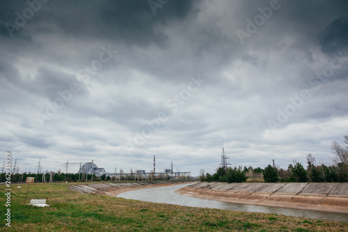  View of the destroyed Reactor 4 and the Memorial for the Chernobyl liquidators, Chernobyl exclusion zone photo