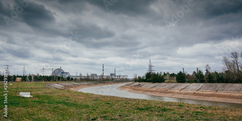  View of the destroyed Reactor 4 and the Memorial for the Chernobyl liquidators, Chernobyl exclusion zone photo