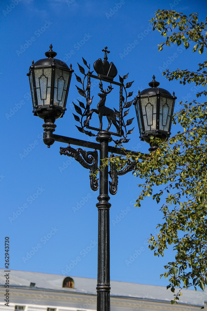 Old street lamp with the emblem of Nizhny Novgorod (Russia)