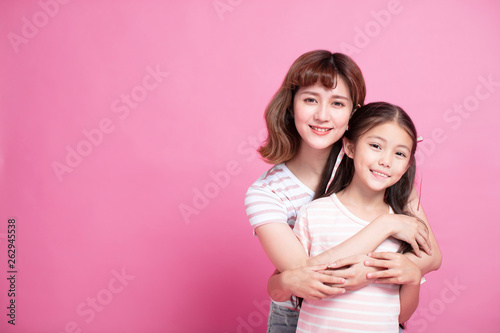 young happy beautiful mother and daughter isolated