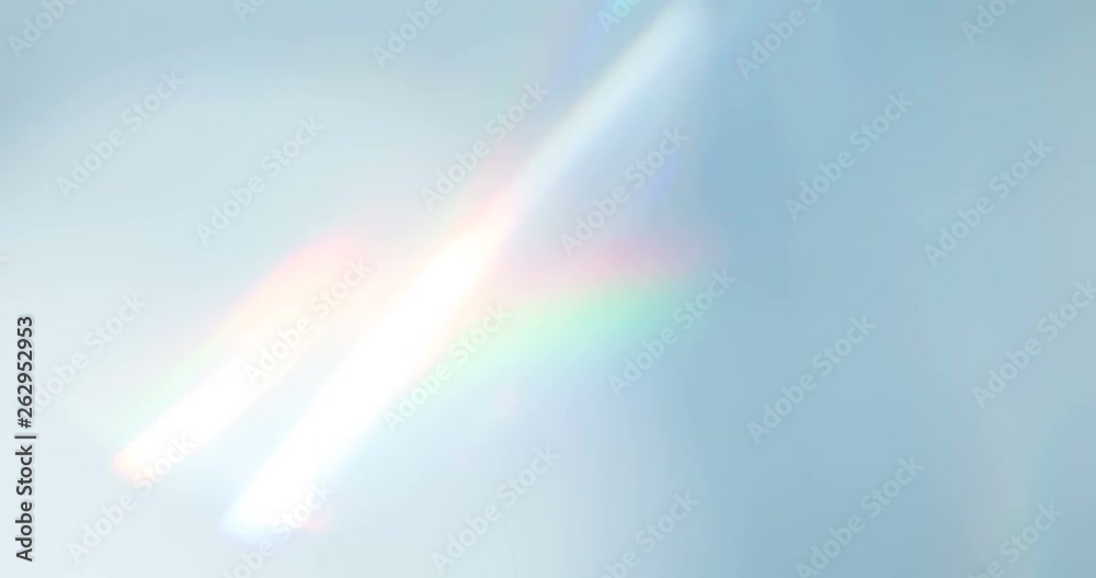 Diamond Creates a Bright Highlight. Loop. The light passes through the facets of a slowly rotating diamond and creates repetitive sparkling highlights and rainbow colors