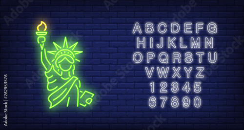 Statue of Liberty on brick background. Neon style illustration