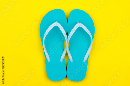 Mint Swimming Slippers on a yellow background