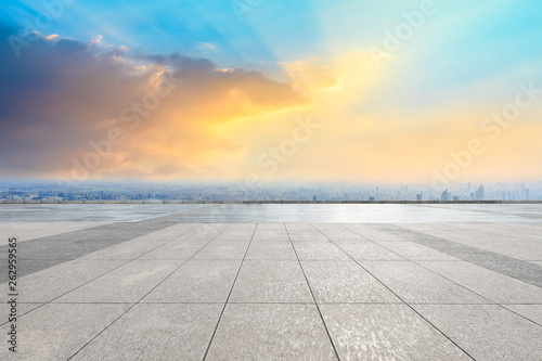 Shanghai city skyline and empty square floor with beautiful clouds scenery at sunset