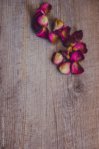 Fototapeta Naklejka Na Ścianę i Meble -  Dried rose petals: for tea, alternative medicine, pot-pourri. Copy space.