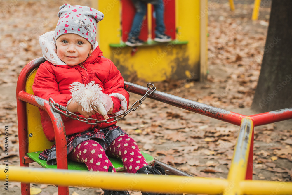Concept of children life. Lifestyle of child, baby girl at park Concept of children life. Lifestyle of child, baby girl at park