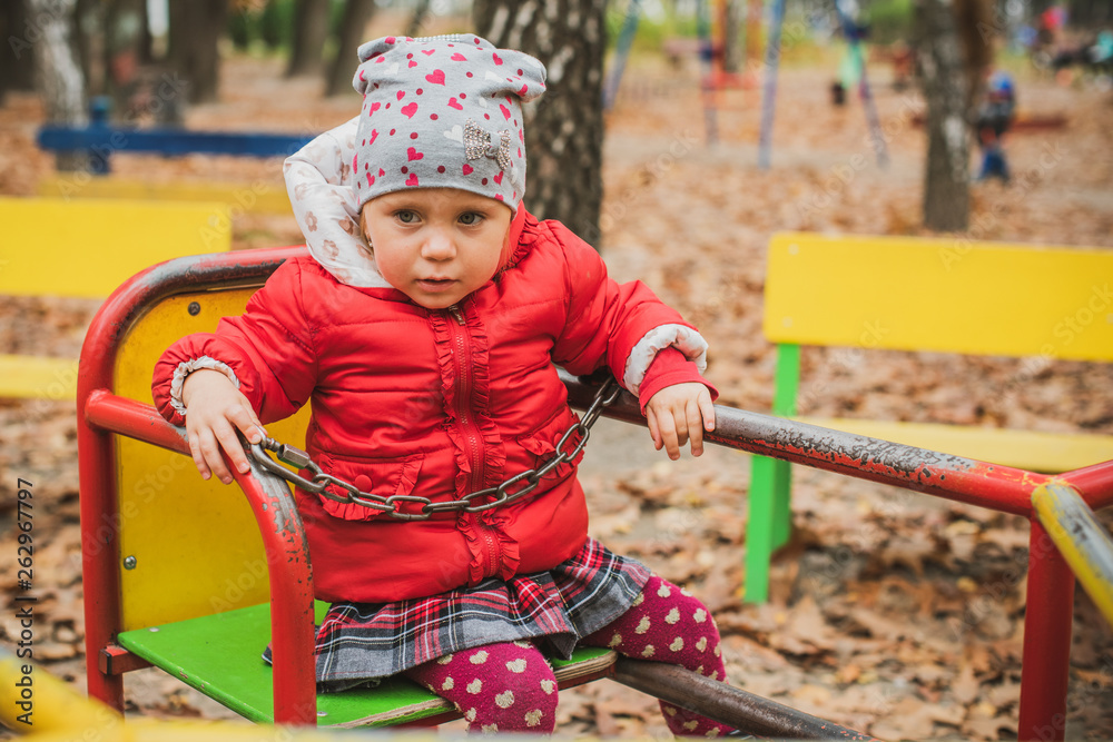 Concept of children life. Lifestyle of child, baby girl at park Concept of children life. Lifestyle of child, baby girl at park
