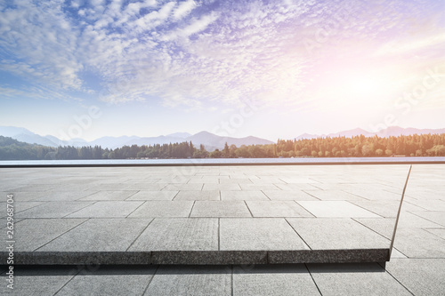 Empty floor and mountain with beautiful clouds