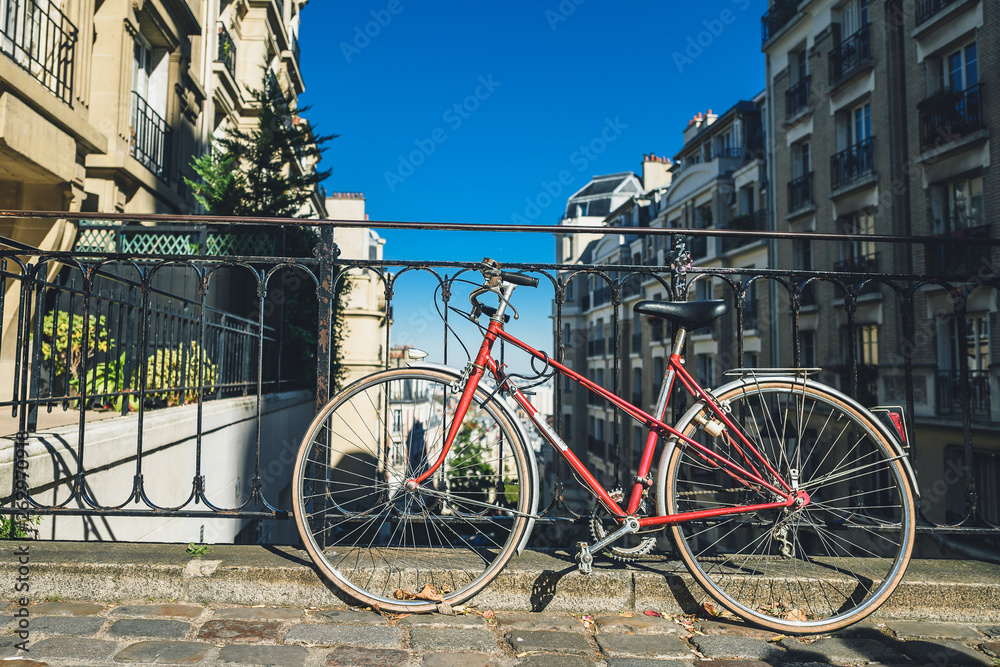 Parked bicycle in Paris Montmartre neighborhood