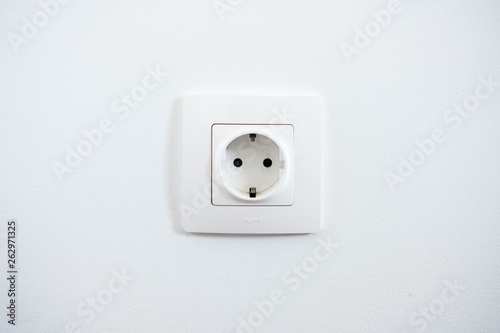 White socket on the white wall