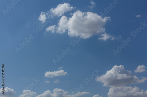 The blue sky and white clouds indicate pure and freshing