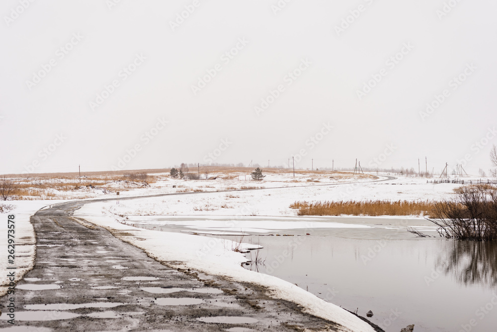 spring landscape, snow melts, beautiful river. Russia, Ural, March spring landscape, snow melts, beautiful river. Russia, Ural, March