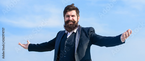 Guy enjoy top achievement. Man bearded proud himself sky background. Superiority and power. Feeling undefeated. Proud of himself. Self proud and narcissistic. Hipster bearded attractive enjoy freedom © be free