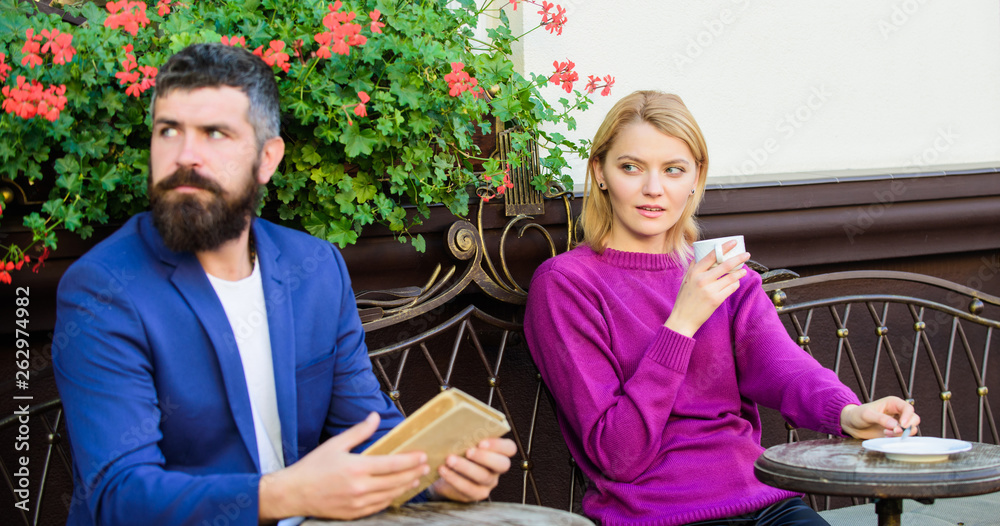 first meeting of man and woman. Brutal bearded hipster and girl drink coffee. First meet of girl and man. Morning coffee. Couple in love on romantic date. woman and man with beard relax in cafe first meeting of man and woman. Brutal bearded hipster and girl drink coffee. First meet of girl and man. Morning coffee. Couple in love on romantic date. woman and man with beard relax in cafe