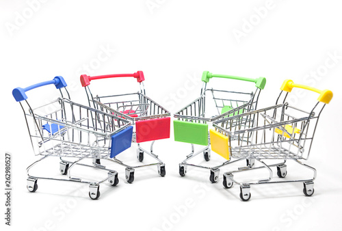 multicolored of mini shopping cart on white background
