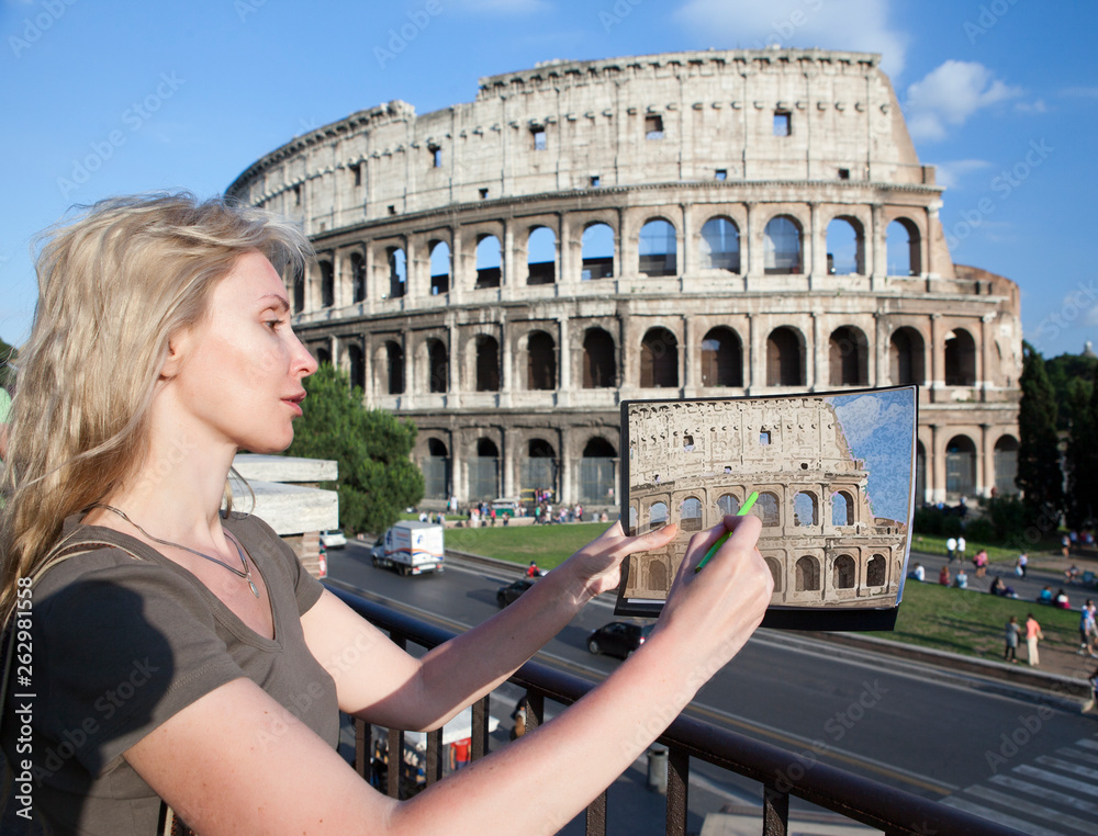 Italy. Rome. The woman draws the Colosseum