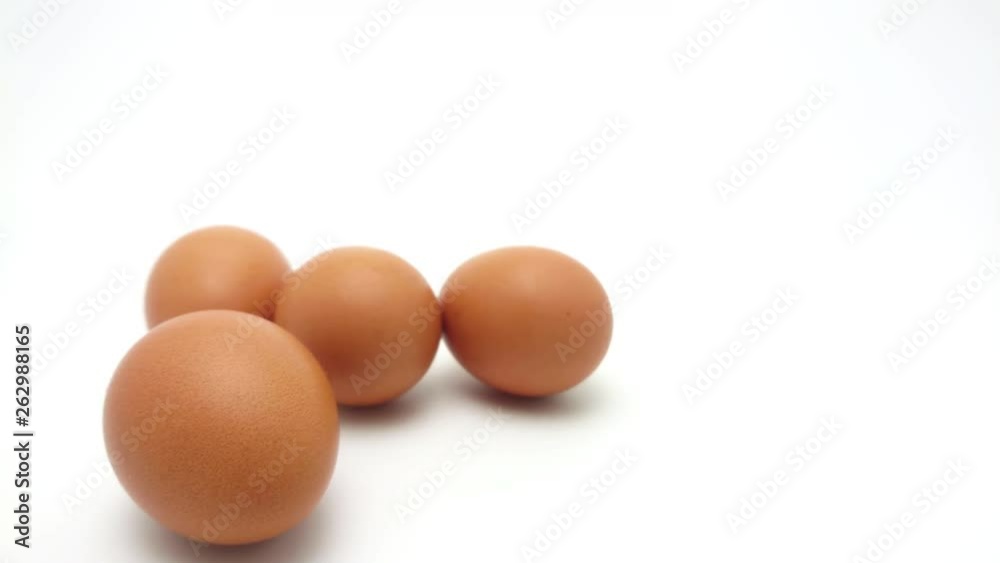 Slide Shot of the raw chicken eggs group isolated on white background Slide Shot of the raw chicken eggs group isolated on white background