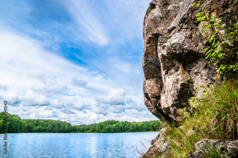 rocky mountain, a lake and the sky in Karelia