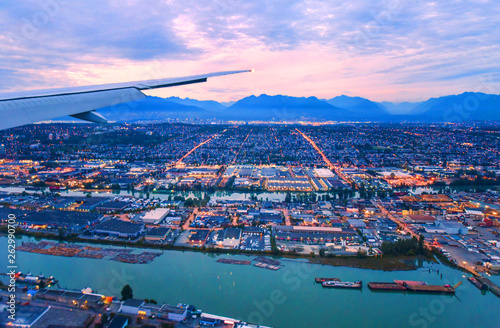 Photography View from airplane window on fields in wing with top view of Vancouver,Canada