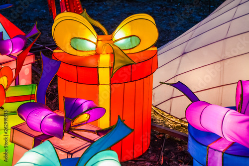 Fototapeta Naklejka Na Ścianę i Meble -  Various bright Chinese small lamps in the park. Garland. An unusual decor for streets and the house. Festive mood