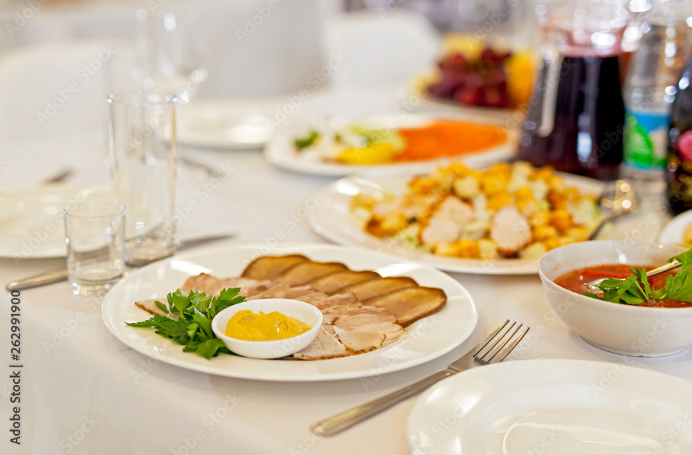 Served tables in restaurants and cafes, meals and drinks on the tables, room design. Served tables in restaurants and cafes, meals and drinks on the tables, room design.