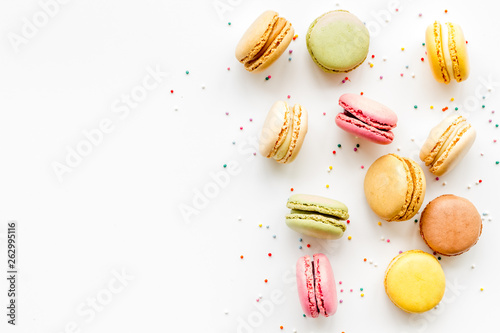 Obraz na plátně Macarons design on white background top view space for text