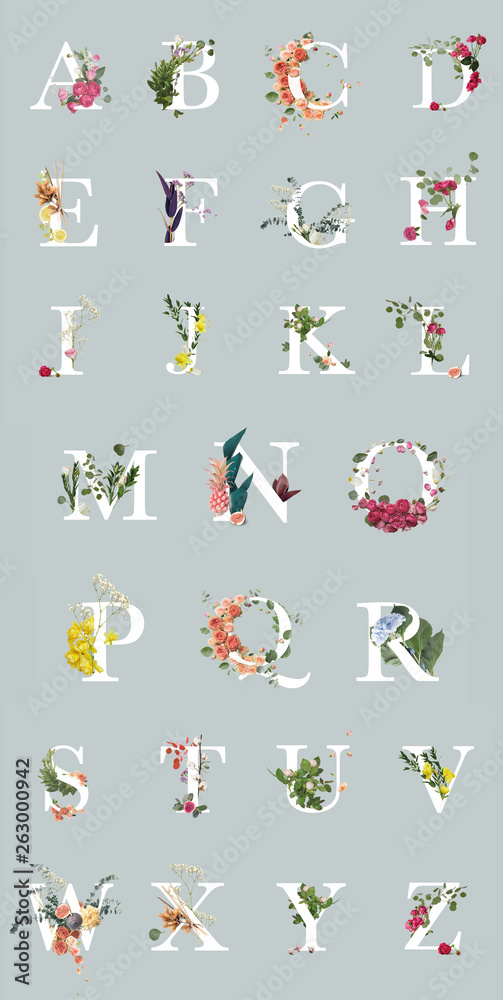 multicolored bright letters with plants and flowers isolated on grey, English alphabet