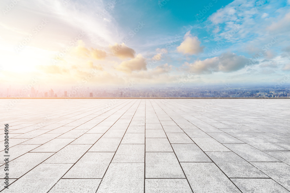 Shanghai city skyline and empty square floor with beautiful clouds at sunset,high angle view