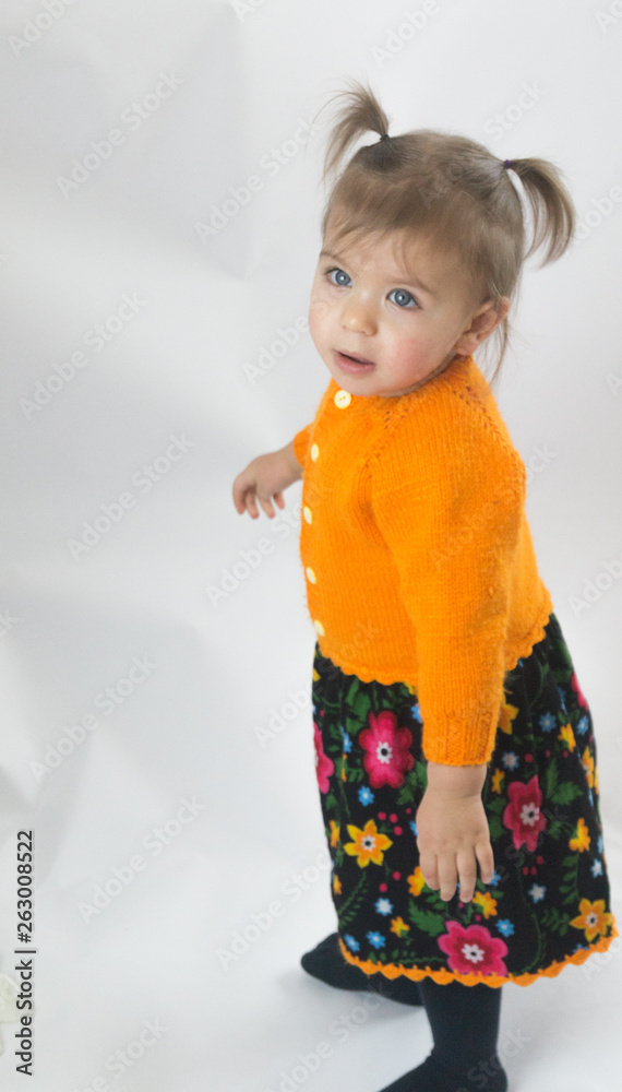 Green eyed little girl standing and green eyes Green eyed little girl standing and green eyes