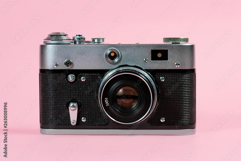 old camera on a pink background