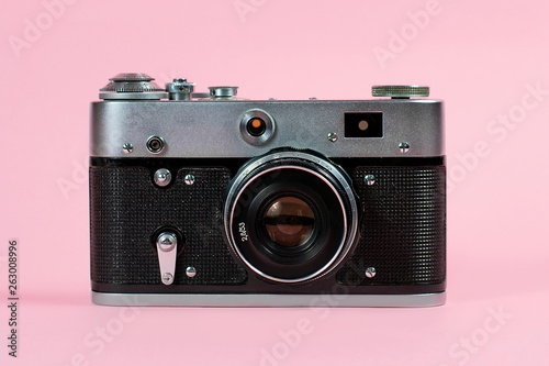 old camera on a pink background