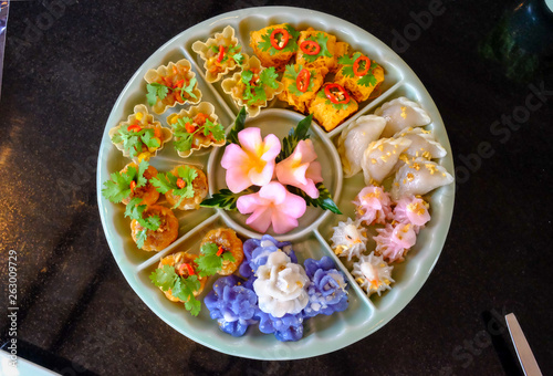 variety of Thai dessert well decorated on ceramic dishes