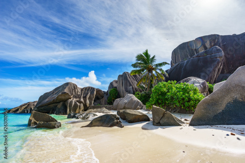 rocks,white sand,palms,turquoise water at tropical beach,la dique,seychelles paradise 3