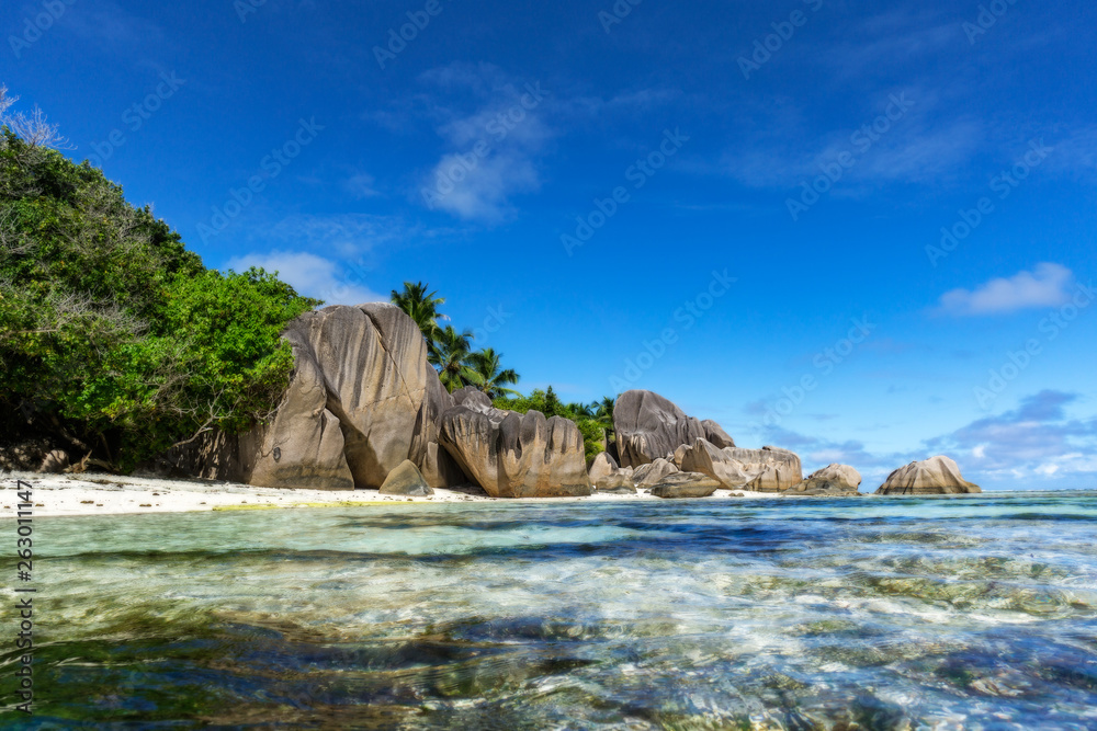 rocks,white sand,palms,turquoise water at tropical beach,la dique,seychelles paradise 5