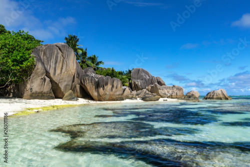 rocks,white sand,palms,turquoise water at tropical beach,la dique,seychelles paradise 6 © Christian B.