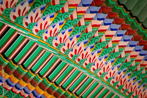 Colorful wooden beams supporting korean traditional temples roofs