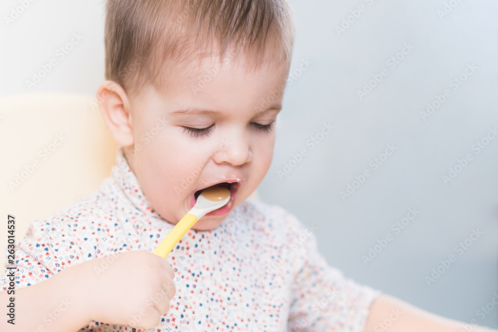 the kid in the kitchen eats milk porridge the kid in the kitchen eats milk porridge