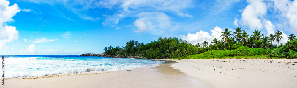 panorama of tropical beach.palms,granite rocks and turquoise water,seychelles 2