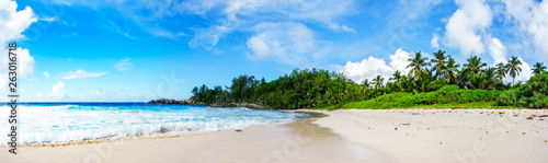 panorama of tropical beach.palms granite rocks and turquoise water seychelles 2